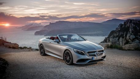Sleek Mercedes Convertible on a Sunset Coastline wallpaper