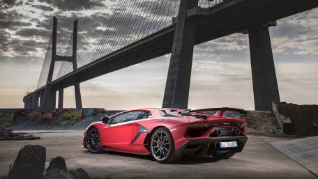 Dreamy Lamborghini Aventador SVJ Under Majestic Bridge wallpaper