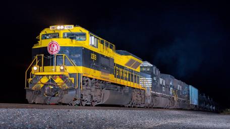 Vibrant Night Train on the Tracks wallpaper