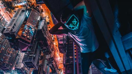 Neon Masked Vigil Over Dizzying Metropolis wallpaper
