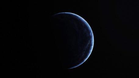 Mysterious Blue Planet in Cosmic Darkness wallpaper