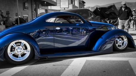 Sleek Blue Hot Rod in Urban Setting wallpaper