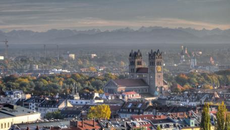 Stunning View of Munich Cityscape with Majestic Mountains wallpaper