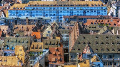 Charming Rooftops of a Historic Cityscape wallpaper