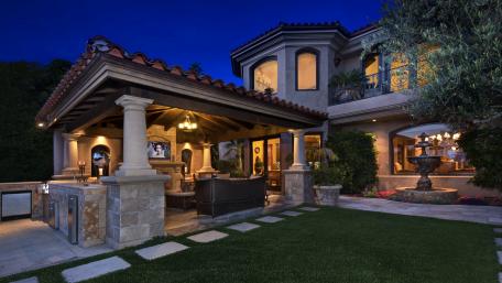Elegant Night View of a City Villa Backyard wallpaper