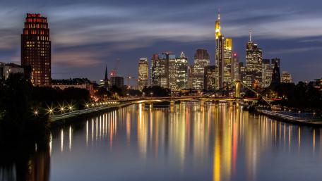 City Lights Glimmering on Water at Night in Frankfurt wallpaper