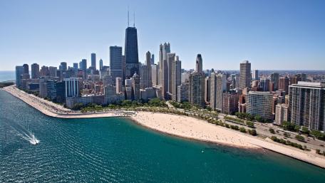 Skyline Serenity Over Chicago's Golden Beach wallpaper