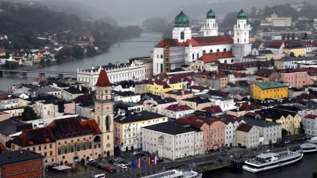Charming Cityscape Under Overcast Skies wallpaper