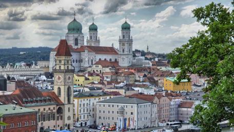 Charming Cityscape Under Dramatic Sky wallpaper