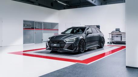 Sleek Audi RS6 ABT in Pristine Garage wallpaper