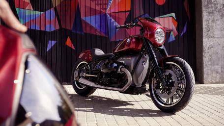 Bold BMW Motorcycle Against Colorful Mural Background wallpaper