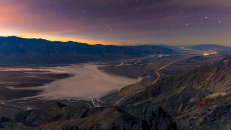 Stunning Night Sky Above Desert Landscape wallpaper