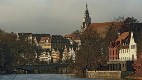 Charming Riverside Cityscape wallpaper