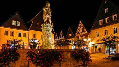 Charming Nighttime City Square Scene wallpaper