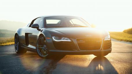 Sleek Audi R8 in Golden Sunset Light wallpaper