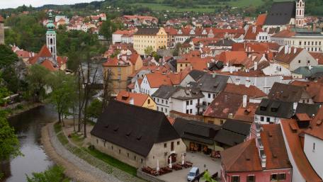 Charming European Townscape with Beautiful Architecture and River View wallpaper