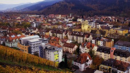 Charming Cityscape Overlooking Vibrant Neighborhoods wallpaper