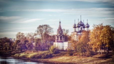 Serene Reflection of a Temple by the River wallpaper
