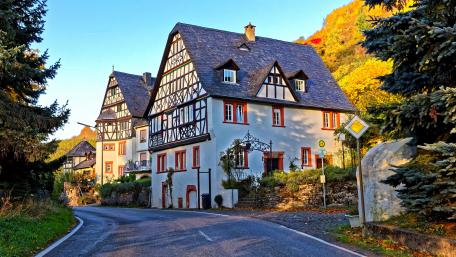 Charming Half-Timbered Houses in Countryside Setting wallpaper