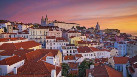 Stunning Sunset Over Colorful Cityscape wallpaper