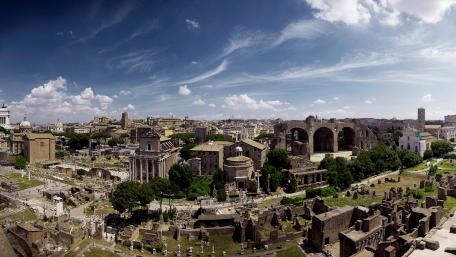 Ancient Ruins in a Modern Cityscape wallpaper