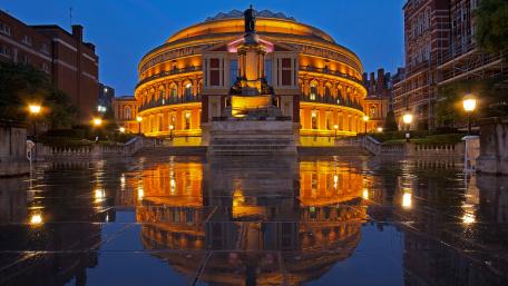 Vibrant Night Reflection of a City Landmark wallpaper