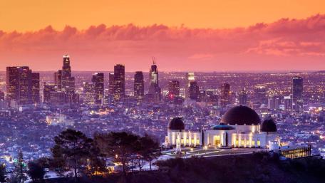 Stunning Sunset Over a Vibrant Cityscape wallpaper