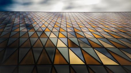 Geometric Glass Facade of a Modern Building wallpaper