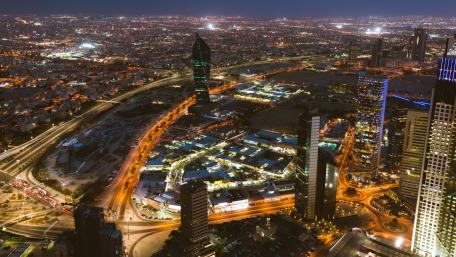 Vibrant Cityscape Illuminated by Night Lights wallpaper