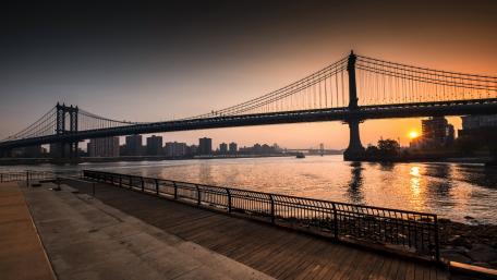 Serene City Sunset Over the Bridge wallpaper