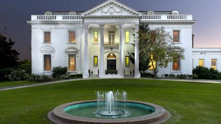 Elegant City Mansion at Dusk wallpaper