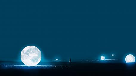 Mystical Night Under Radiant Moons wallpaper