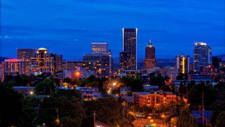 Stunning Cityscape at Dusk with Vibrant Lights wallpaper