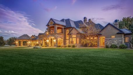 Charming Estate Under Evening Sky wallpaper