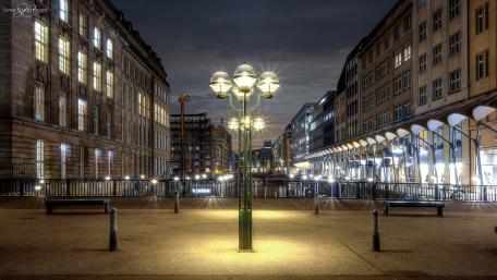 Urban Nightscape Illuminated by Streetlights wallpaper