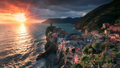 Breathtaking Sunset Over Coastal Cityscape in Cinque Terre wallpaper