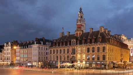 Charming Cityscape at Dusk with Historic Architecture wallpaper