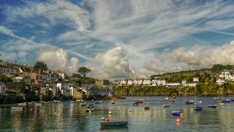 Charming Coastal Village Under a Beautiful Sky wallpaper