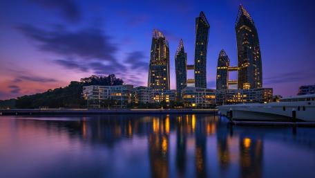 Cityscape at Dusk with Skyscrapers and Reflection wallpaper