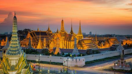 Golden Temples at Dusk Over Bangkok Sky wallpaper