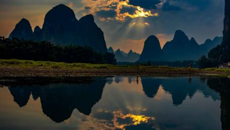 Serene Mountain Reflections in Nature's Embrace wallpaper