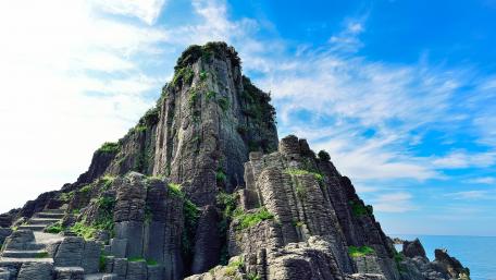 Majestic Rock Formation Under a Blue Sky wallpaper