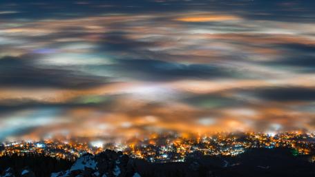Dreamy Cityscape Above the Clouds wallpaper
