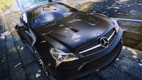 Sleek Matte Black Mercedes Roadster Wallpaper wallpaper