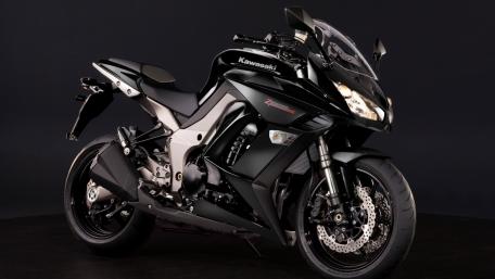 Sleek Black Kawasaki Motorcycle Wallpaper wallpaper