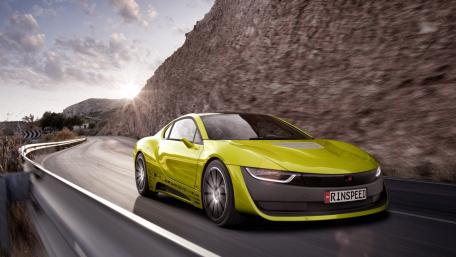 Vibrant Rinspeed Sports Car on Scenic Roadway wallpaper
