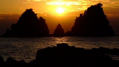 Majestic Sunset Over Coastal Rock Stacks wallpaper