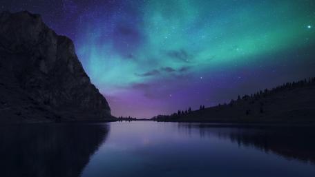 Ethereal Lake Under Northern Lights wallpaper