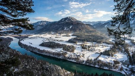 Winter Serenity Over Alpine River Valley wallpaper
