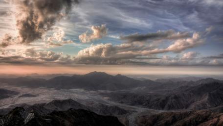 Majestic Mountain Horizon Above the Clouds wallpaper